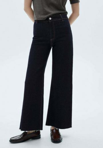 Клешеные джинсы