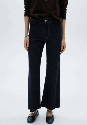 Клешеные джинсы