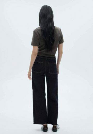 Клешеные джинсы