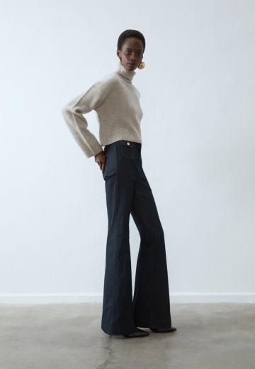 Клешеные джинсы