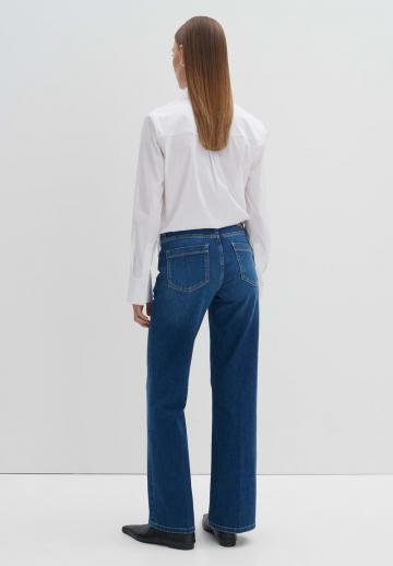 Клешеные джинсы