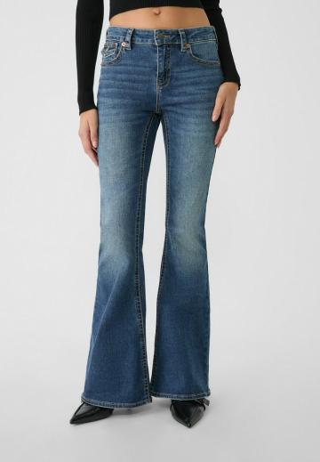 Клешеные джинсы
