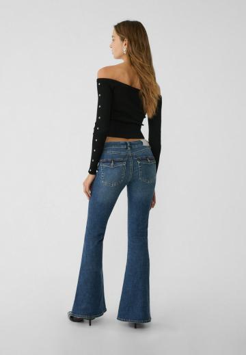 Клешеные джинсы