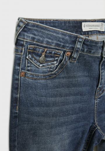 Клешеные джинсы