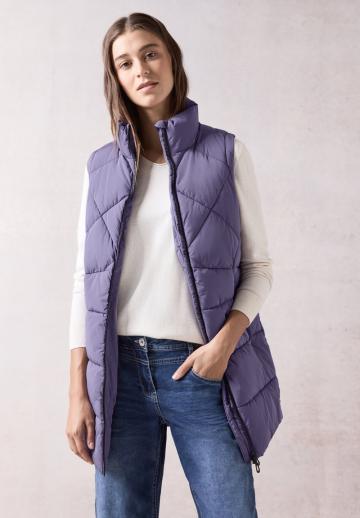 Длинный жилет