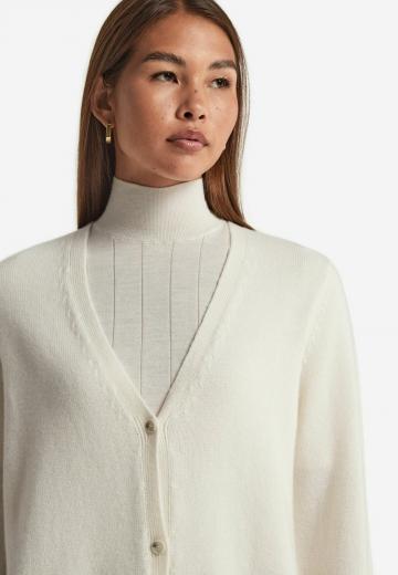 Длинный жилет