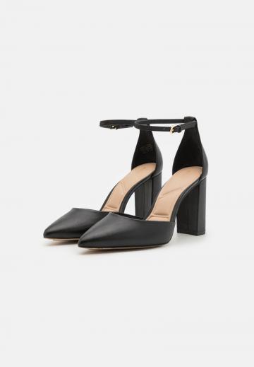 Туфли на высоком каблуке