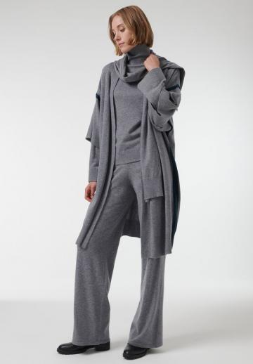 Длинный жилет