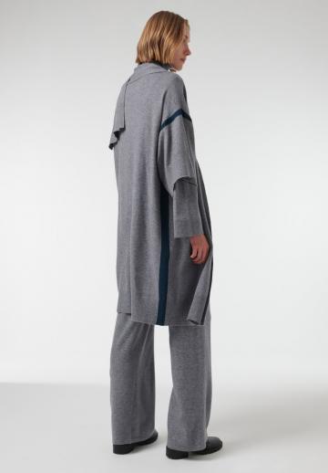 Длинный жилет