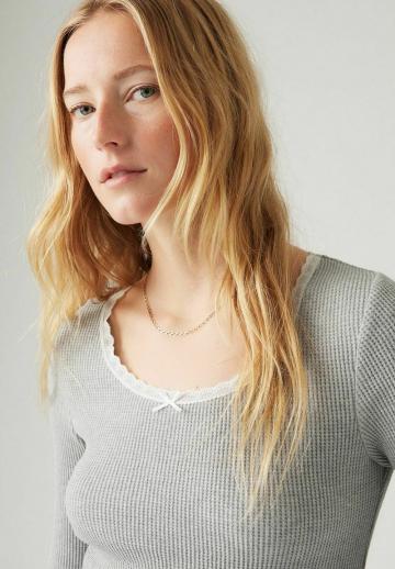 Пуловер в полоску