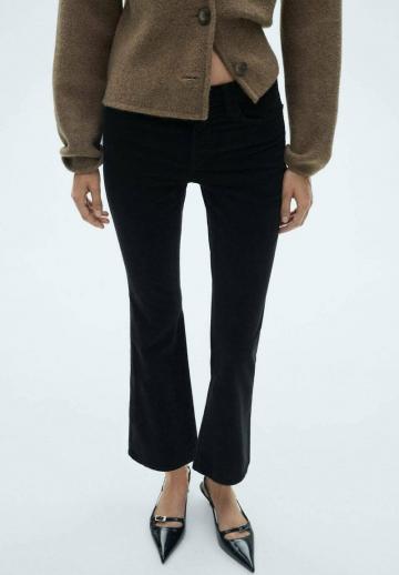 Клешеные джинсы