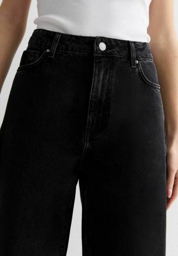 Клешеные джинсы