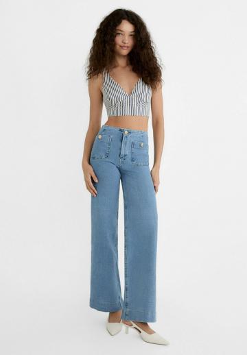 Клешеные джинсы