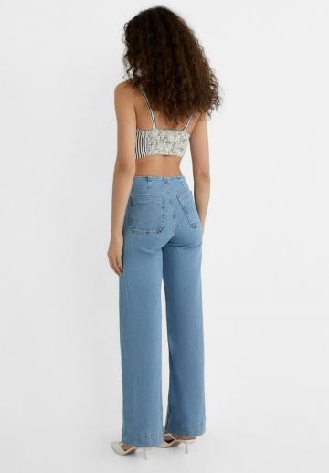 Клешеные джинсы