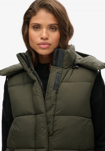 Длинный жилет