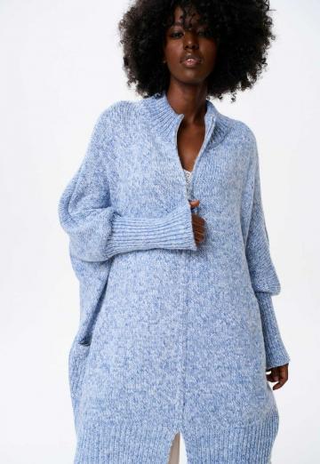 Длинный жилет