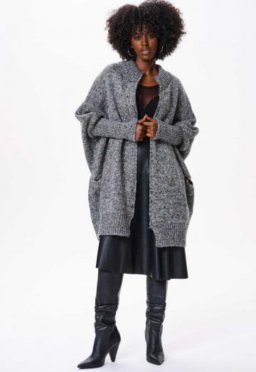 Длинный жилет