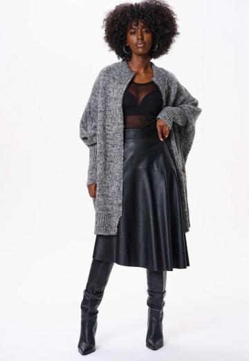 Длинный жилет