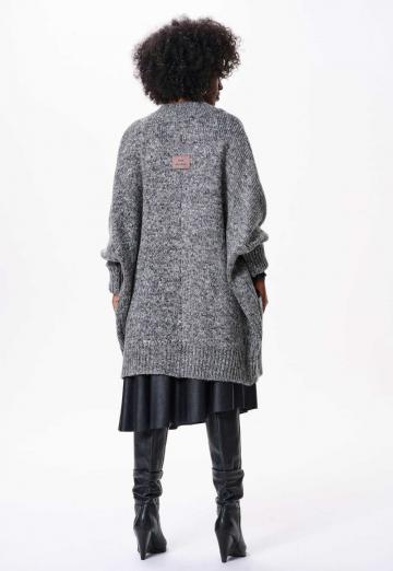 Длинный жилет