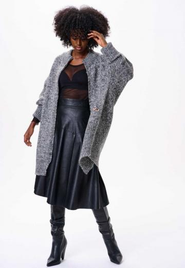 Длинный жилет