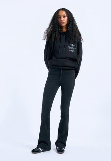 Клешеные джинсы