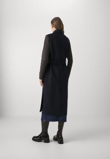 Длинный жилет