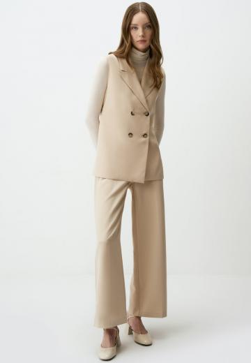 Длинный жилет