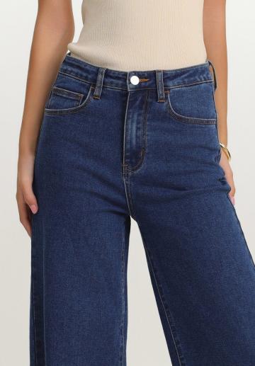 Клешеные джинсы