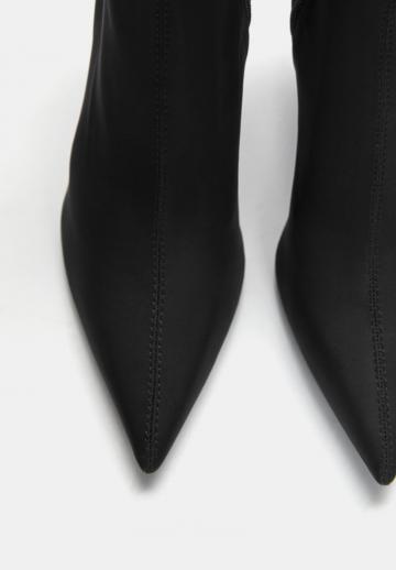 Высокие сапоги