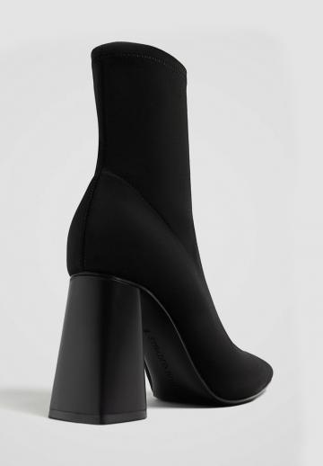 Высокие сапоги