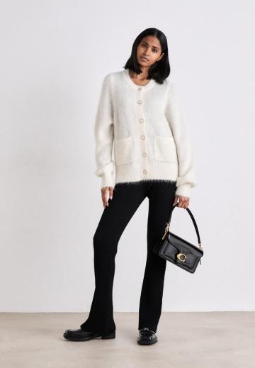 Вязаный жилет