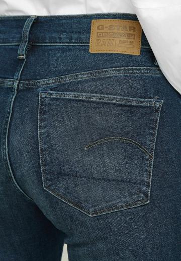 Клешеные джинсы