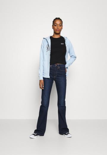 Клешеные джинсы