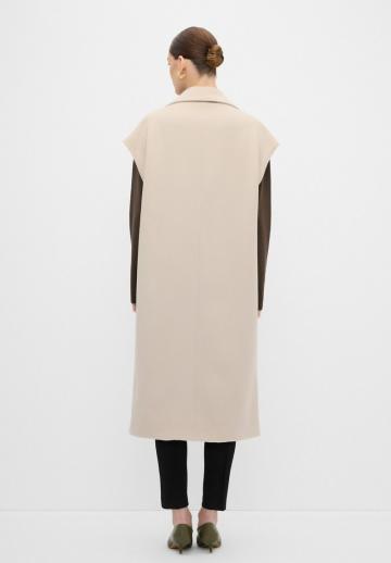 Длинный жилет