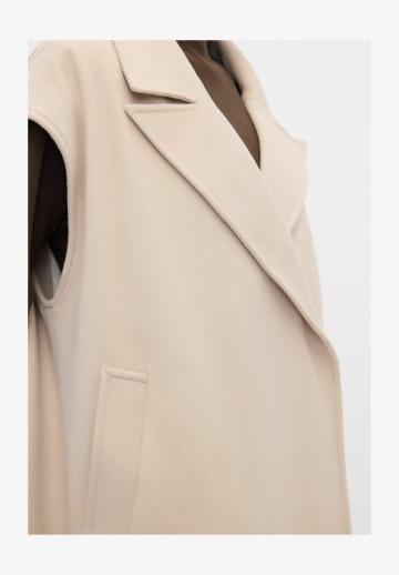 Длинный жилет