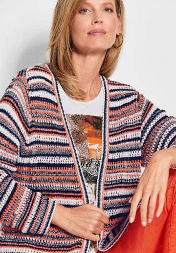 Длинный жилет