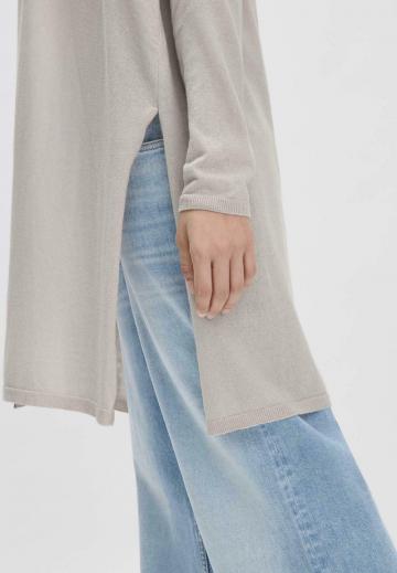 Длинный жилет