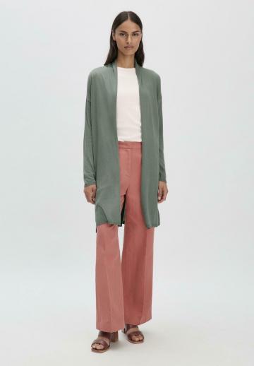 Длинный жилет