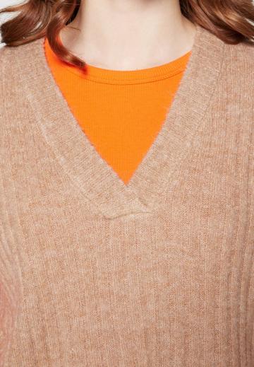 Длинный жилет