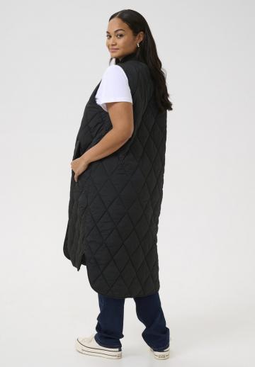 Длинный жилет