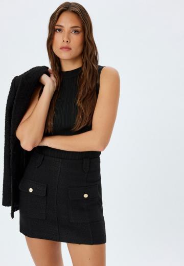 Юбка с накладными карманами