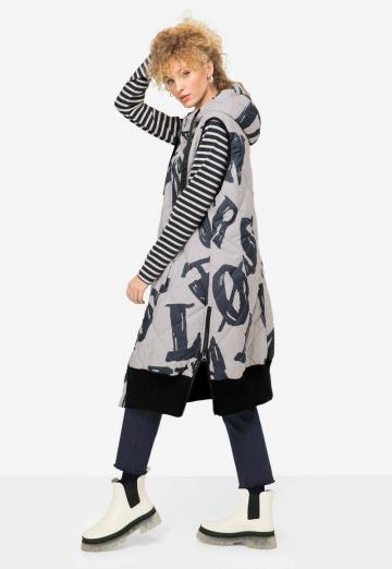 Длинный жилет