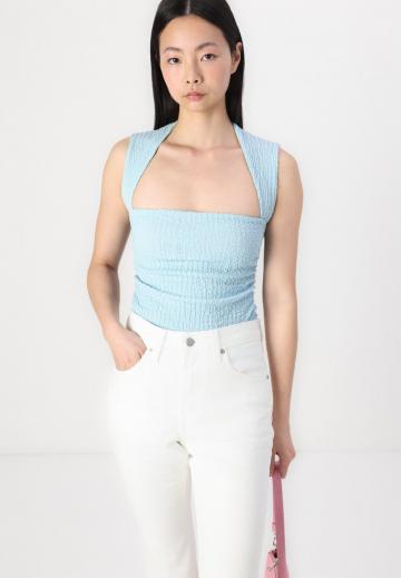 Клешеные джинсы