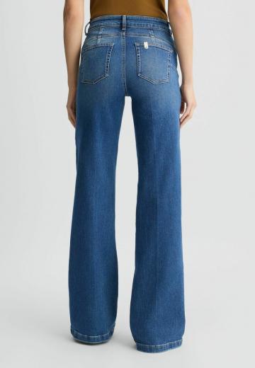 Клешеные джинсы