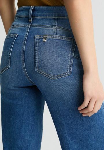 Клешеные джинсы