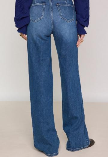 Клешеные джинсы