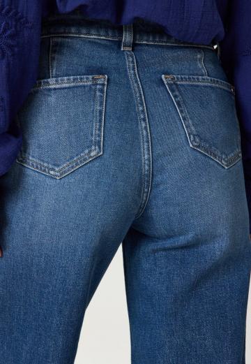 Клешеные джинсы