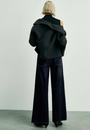 Клешеные джинсы