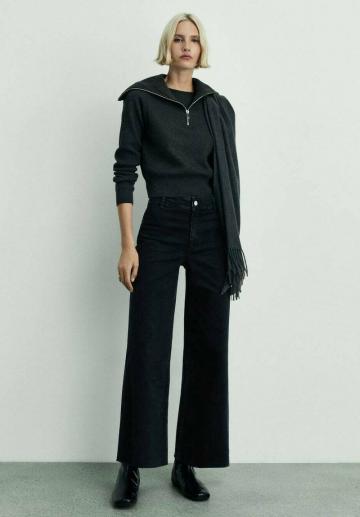 Клешеные джинсы