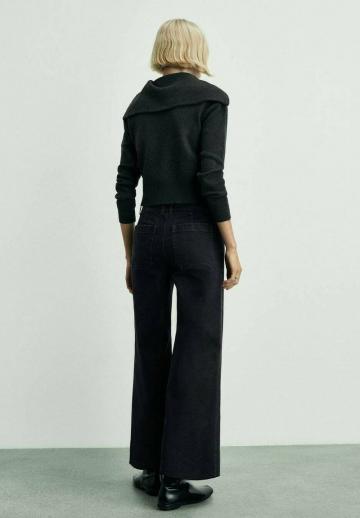 Клешеные джинсы